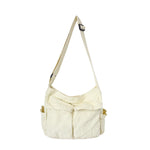 Sac messager en toile de couleur unie