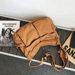 Sac messager en toile de couleur unie
